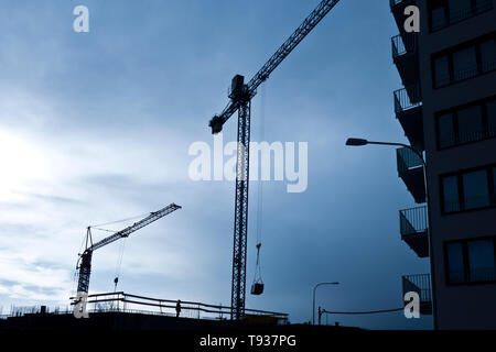 two construction towers at a construction site Stock Photo