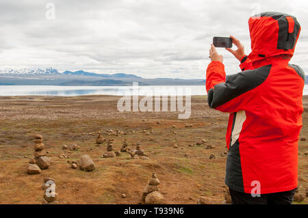 Tourists at Thingvellir National Park, Iceland Stock Photo