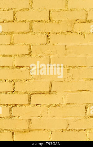 old yellow brick wall background Stock Photo