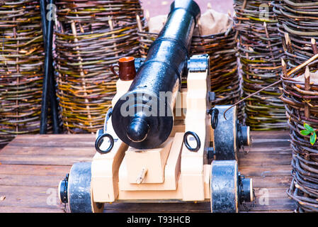 Old battle canon on the ship somewhere in the Russia Stock Photo