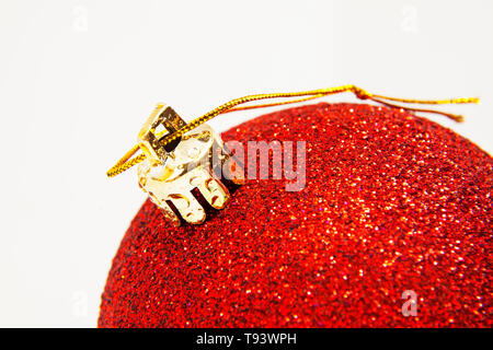 red christmas ball with gold thread Stock Photo
