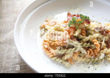 Fusilli spaghetti carbonara Stock Photo