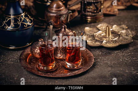 Turkish tea in traditional glass on tray Stock Photo