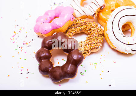 Colorful Donuts on white  background. Stock Photo
