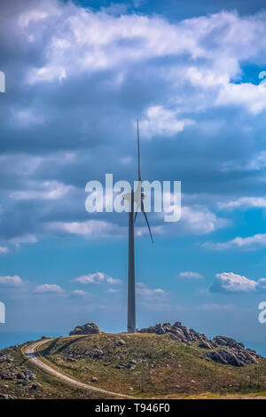 View of a wind turbine on top of mountains, in Portugal Stock Photo