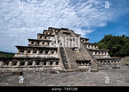 Mesoamerica Pyramid of the Niches at the pre-Columbian archeological complex of El Tajin in Tajin, Veracruz, Mexico. El Tajín flourished from 600 to 1200 CE and during this time numerous temples, palaces, ballcourts, and pyramids were built by the Totonac people and is one of the largest and most important cities of the Classic era of Mesoamerica. Stock Photo