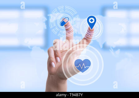 Female medic touching invisible display with fingers as modern cardiology concept Stock Photo