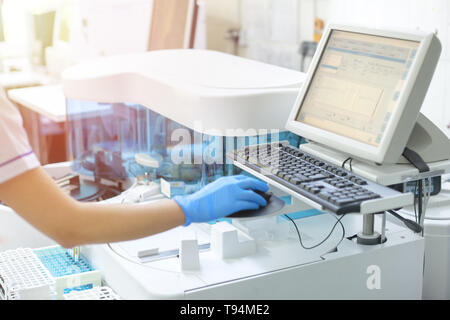 image of scientist using microscope in laboratory Stock Photo