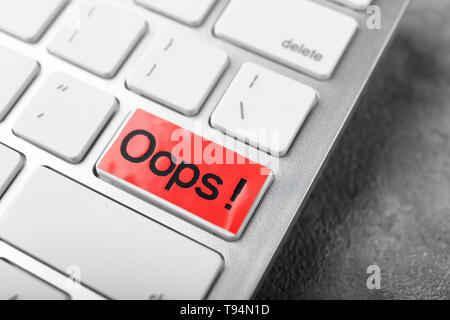 Text OOPS on PC keyboard button, closeup. Mistake concept Stock Photo