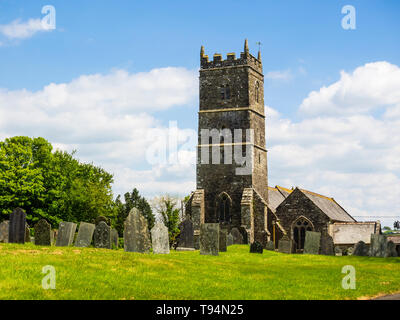 14th/15th century St Sampson's church and graveyard in the village of South Hill, Cornwall, at the edge of Bodmin Moor Stock Photo