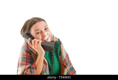 Photo of a woman who is speaking at an old phone, isolated on white background Stock Photo