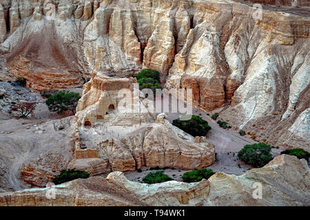 Marl stone formations. Eroded cliffs made of marl. Marl is a calcium carbonate-rich, mudstone formed from sedimentary deposits. Photographed in Israel Stock Photo