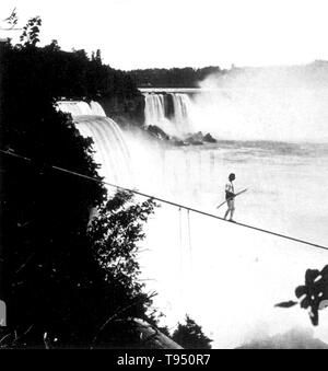 Henry Bellini (1841 - 1888) was an English tightrope walker. In 1873, at the age of 32, he went to Niagara Falls. On August 25th 1873, he made his first tight rope walk across the Niagara River using a 1,500 foot long - 2.5 inch diameter rope weighing 2,500 pounds. He combined a tight rope walk with a leap into the churning river below. He tried crossing using a 48 pound - 22 foot long balance pole. Following his leap into the water, Bellini was picked up by an awaiting boat. Stock Photo