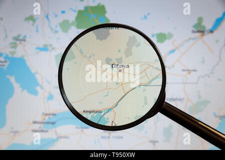 Ottawa, Canada. Political map. The city on the monitor screen through a magnifying glass. Stock Photo