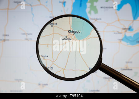 Chicago, United States. Political map. The city on the monitor screen through a magnifying glass. Stock Photo