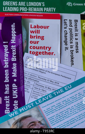 Overhead view of poll card & election material for European Parliament Elections 2019 in UK, showing different messages from the parties, portrait. Stock Photo