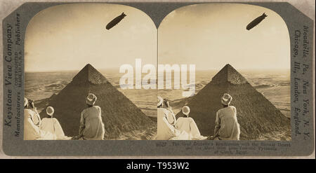 Stereograph of the Graf Zeppelin over the Giza pyramids in Egypt, on April 10, 1931. The LZ 127 Graf Zeppelin was a German-built and -operated, passenger-carrying, hydrogen-filled, rigid airship which operated commercially from 1928 to 1937. When it entered commercial service in 1928, it became the first commercial passenger transatlantic flight service in the world. Stock Photo