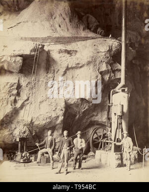 Engine and dynamo-electric machine used in lighting the Jenolan Caves. Charles Smith Wilkinson (Australian, born England, 1843 - 1891); New South Wales, Australia; about 1885 - 1890; Collodion print. The Jenolan Caves are limestone caves located within the Jenolan Karst Conservation Reserve in the Central Tablelands region, west of the Blue Mountains, in New South Wales, in eastern Australia. Stock Photo