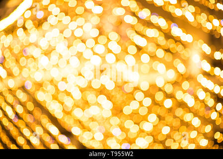 Abstract christmas background, light blur creating nice bokeh, yellow, gold and orange. Stock Photo