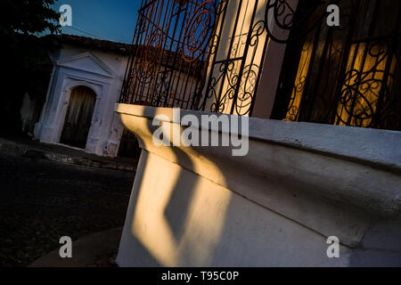 Spanish colonial houses are seen on the street near the workshop of Laura Peña, a 67-years-old Salvadoran cigar maker, in Suchitoto, El Salvador. Stock Photo