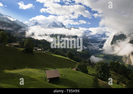 The spectacular Lauterbrunnen valley in early morning from near Wengwald, Bernese Oberland, Switzerland Stock Photo