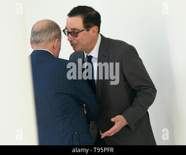 United States Secretary of the Treasury Steven T. Mnunchin(R) speaks with Director of the National Economic Council Larry Kudlow(L)  after United States President Donald J. Trump spoke on modernizing our immigration system for a stronger America at the White House in Washington, DC, May 16, 2019. Credit: Chris Kleponis / CNP | usage worldwide Stock Photo