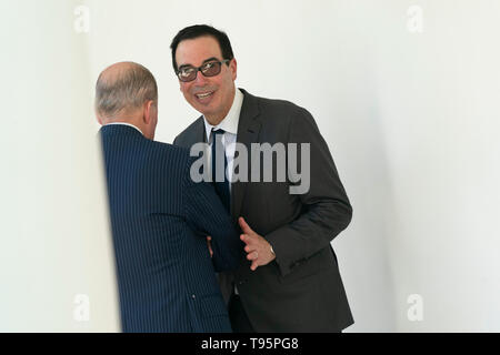 United States Secretary of the Treasury Steven T. Mnunchin(R) speaks with Director of the National Economic Council Larry Kudlow(L)  after United States President Donald J. Trump spoke on modernizing our immigration system for a stronger America at the White House in Washington, DC, May 16, 2019. Credit: Chris Kleponis / CNP | usage worldwide Stock Photo