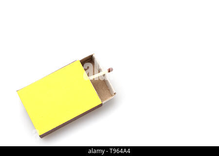 Matches made of natural wood for fire yellow boxes, on a white background, the concept of security. Stock Photo