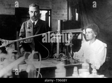 Marie and Pierre Curie in their laboratory in Paris. Pierre Curie was introduced to Maria Sklodowska by a friend and took Maria into his laboratory as his student. He began to regard her as his muse. She refused his initial proposal, but finally agreed to marry him on July 26, 1895. Marie Curie (November 7, 1867 - July 4, 1934) was a Polish-French physicist and chemist. Stock Photo