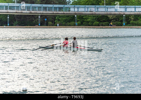 Two women team boat training on the rowing channel in Plovdiv city, Bulgaria Stock Photo