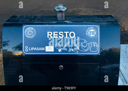 A recycling bin for odd items, lightbulbs and razors and such in Seville Stock Photo