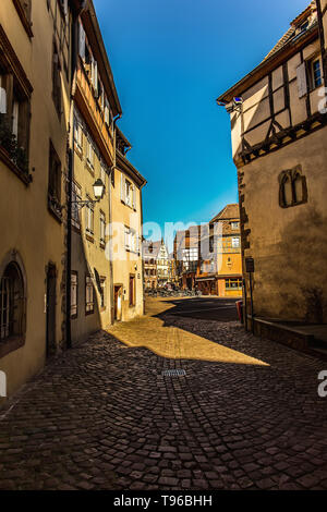 Colmar, Alsace, France, February 24, 2019. Cozy and beautiful streets of the French city on a sunny spring warm day Stock Photo