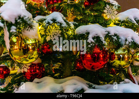 Christmas background of de-focused lights with decorated tree Stock Photo