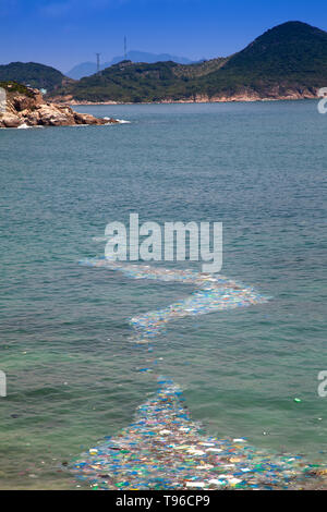 Plastic waste is stranded on the beach at Cam Ranh, south china sea, Ninh Thuan, Vietnam Stock Photo