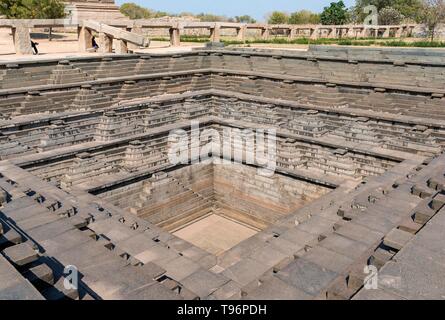 Public Bath, stepped square water tank, at Royal Enclosure, Hampi, India Stock Photo