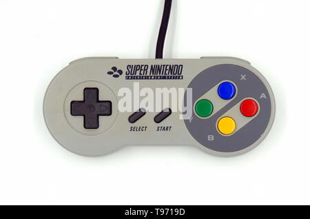 Amsterdam, the Netherlands-  December 10, 2017: Super Nintendo (SNES) game controller. Stock Photo