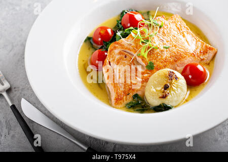 Salmon with vegetables Stock Photo