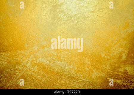 Gold Stone Background and Gradients Shadow. Beautiful Bright Brass Wall for Paper Decoration Element. Shiny Yellow Leaf Golden Foil, Steel Texture. Stock Photo