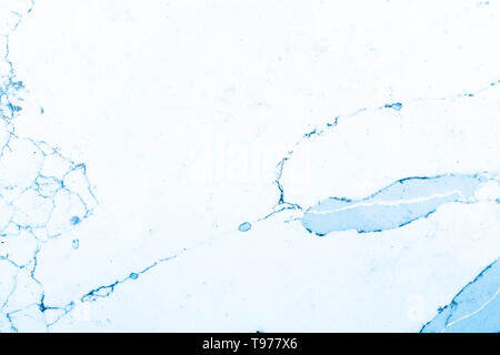 Blue and white marble pattern, showing white background with blue veins, or grains, in the marble slate. This is a cut marble slate. Stock Photo