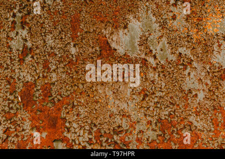 Rusty iron texture, brown old fence with stains and peeling paint. Textured wallpaper for design. Stock Photo