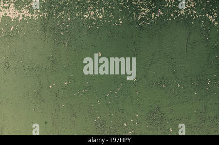 Rusty iron texture, green old fence with stains and peeling paint. Textured wallpaper for design. Stock Photo
