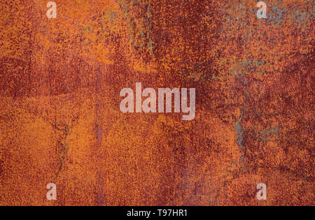 Rusty iron texture, brown old fence with stains and peeling paint. Textured wallpaper for design. Stock Photo