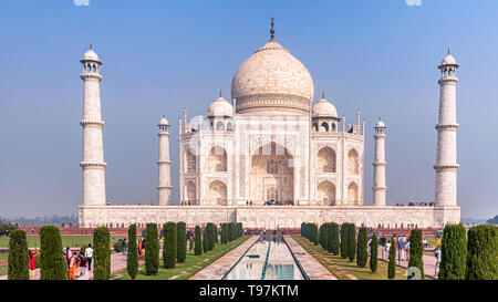 Agra, India - Nov 21, 2018: Tourists visiting Taj Mahal build in 17th century by Moghul Emperor Shah Jehan in memory of his beloved wife Mumtaz Mahal  Stock Photo