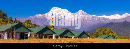 Annapurna mountain Panoramic view from Australian base camp Nepal.Isolated blue sky and prayar flags. Stock Photo