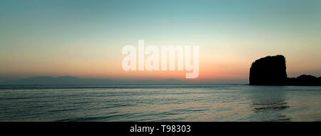 Silhouettes and sunrise on Sepoc beach, Tingloy Island, Philippines Stock Photo