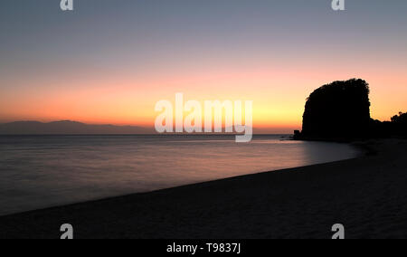 Silhouettes and sunset on Sepoc beach, Tingloy Island, Philippines Stock Photo