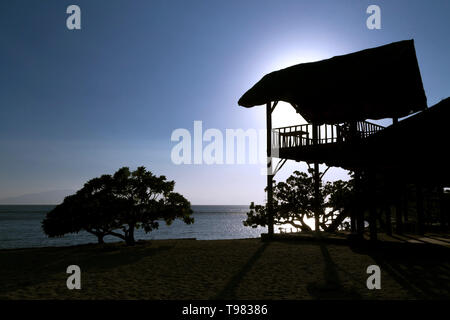 Silhouettes and sunset on Sepoc beach, Tingloy Island, Philippines Stock Photo