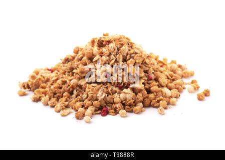 Heap of premium fruit and nut muesli isolated on white background Stock Photo