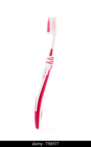 Pink toothbrush isolated on a white background Stock Photo