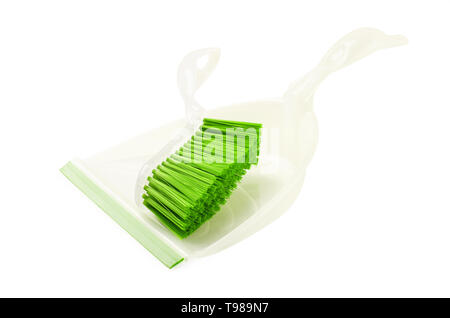 Green set of brush and dustpan, household cleaning utensil isolated on a white background Stock Photo